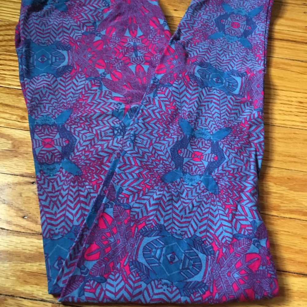 Bundle of two or more only please . Lularoe OS feather print leggings!